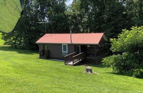 Logan Cabin | Romantic cabin with fishing and hot tub