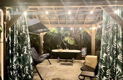 Ohia Estates House | Romantic Retreat, Relax at Hot-tub, Indoor & Outdoor shower, firepit, 5 min to Hawaii Volcano park
