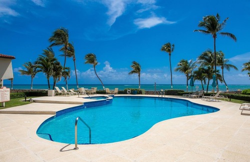 West Bay Villa | Romantic Walks on the Beach, Gorgeous Sunsets from Any Balcony.