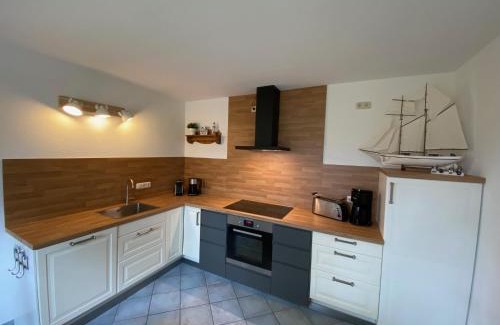 Pruchten Apartment | romantisches Ferienhaus Boddenblick mit Sauna
