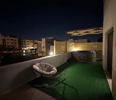 Amman Apartment | Rooftop pool with terraces F-R