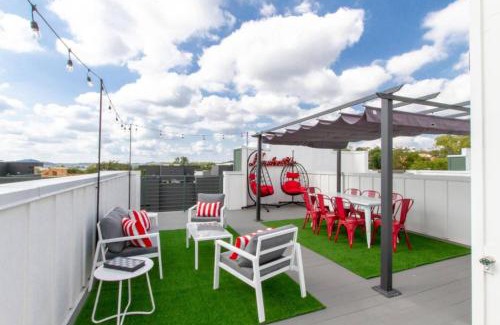 Katie Hill Neighborhood House | Rooftop Skyline Views with Ping Pong