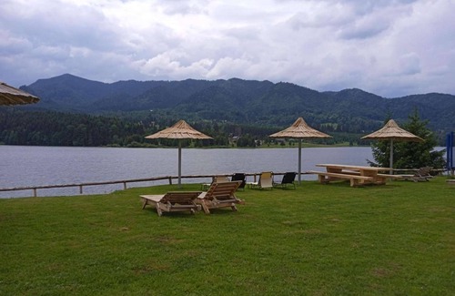 Colibita Apartment | Room at lake Colibita with an incredible view over the lake with Jacuzzi.