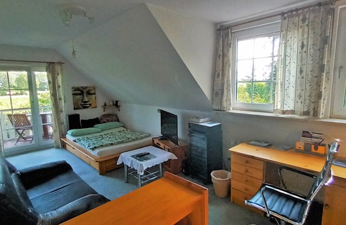 Nahe House | Room with balcony and garden