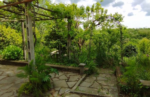 Orvieto House | Room with bathroom entrance and private garden nestled in the green hills of Umbria