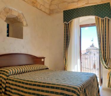 Monte Sant'Angelo House | Rooms Dimora Arco - Affitti Brevi Italia