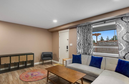 South Delridge House | Roomy, dog-friendly home with private hot tub, fireplaces, decks & living spaces
