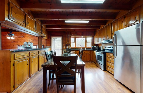 Oakman House | Roomy, three-story mountain home with two full kitchens, game rooms, & AC