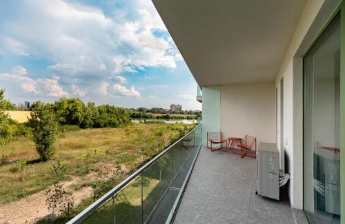 Sector 1 Apartment | Roots Two - Tranquil Lakeview Escape with Balcony