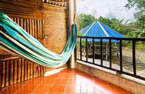Mocoa Apartment | ROYAL COLIBRI ROYAL LAKE AND FOREST VIEW ROYAL COLIBRI ROYAL ROOM WITH PRIVATE DINING AREA