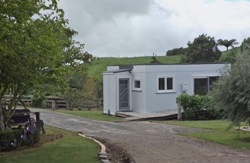 Kaitake Cottage | Rural cottage-large garden and farm outlook.