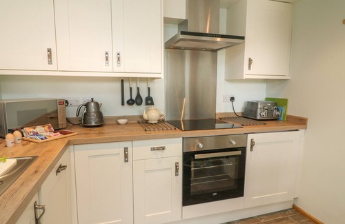 Settle Cottage | RUSHTON BARN, pet friendly, with open fire in Settle