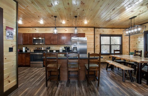 Sevierville Cabin | Rustic-Chic Retreat with Hot Tub, Stone Fireplace & Game Room
