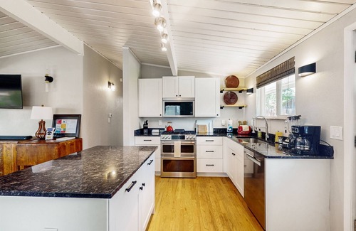 Central Colorado Springs House | Rustic mountain view home w/large yard, pond, & updated kitchen - dog-friendly