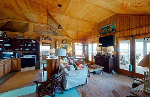 Folly Beach House | Rustic oceanfront home with screened porch, free WiFi, deck, & beach access