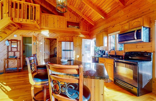 Clayton Cabin | Rustic two-story lakefront cabin near beach with dock, lake & mtn views, & deck
