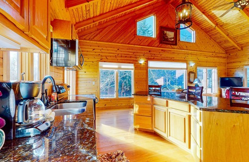 Clayton Cabin | Rustic two-story lakefront cabin near beach with dock, lake & mtn views, & deck