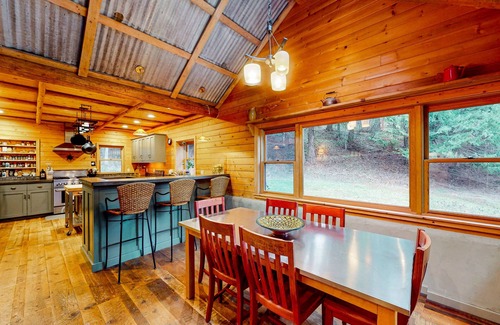 Sagle House | Rustic woodland home with hot tub, patios & fireplaces - near lake access