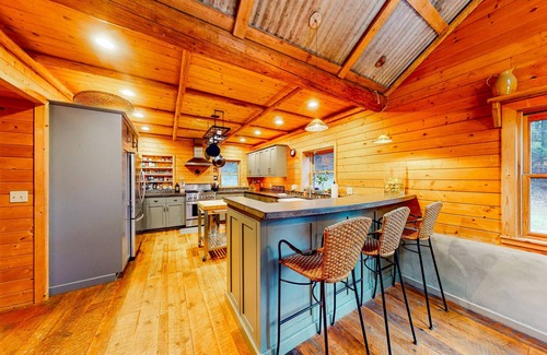 Sagle House | Rustic woodland home with hot tub, patios & fireplaces - near lake access