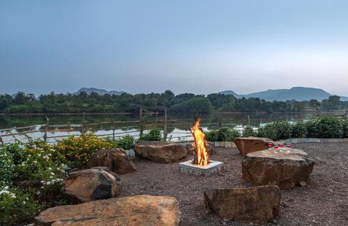 Mahiravani House | SaffronStays Lake House Marigold, Nashik - rustic cottages with private plunge pool