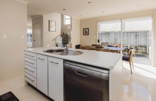 New Plymouth Apartment | Sail-Shaped Townhouse in New Plymouth