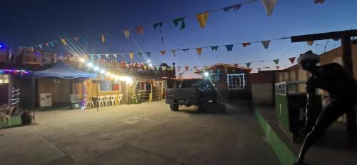 Rosarito House | Salón y habitaciones