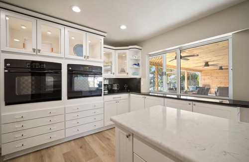Bal Harbour House | Saltwater canal front 4 bedroom tropical home with private pool and boat dock