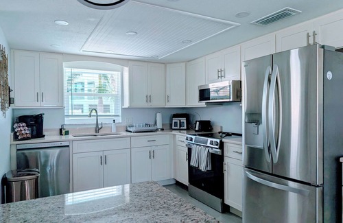 Holmes Beach House | Salty Harbor AMI pool retreat near the Beach