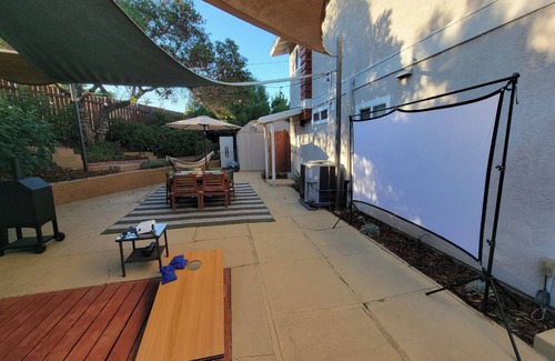 Fairmount Park Villa | San Diego's 4-bed Oasis with Hot Tub, Gym, Outdoor Theater & Huge Yard.