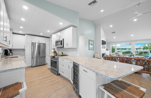 Sanibel House | Sancroft: Stunning Pool Home w Direct Water Access