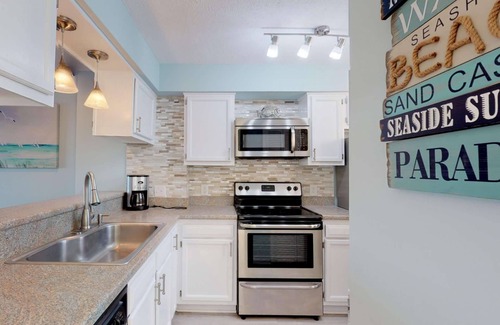 Kure Beach Condo | Sand Castle - Ocean Dunes Beachfront Condo w/Lovely Views, Large Deck, Indoor/Outdoor Pools, Tennis