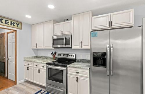 Gulf Lagoon Beach House | Sand Castle-Pool, Game Rooms, covered outdoor space with tiki bar, 1min walk to beach