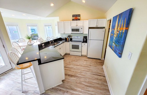 Village of Stump Sound House | Sand Dancer – Sun, Surf & Poolside Relaxation