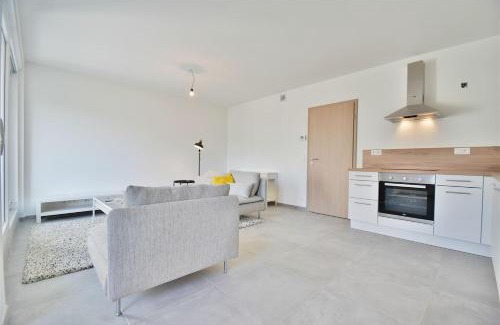 Outremeuse Apartment | Sandy Shores Serenity Flat Liège Centre