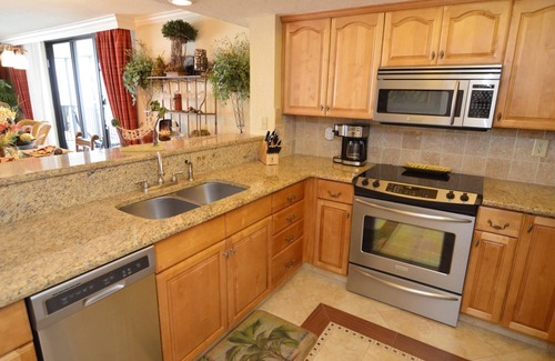 Punta Rassa Condo | Sanibel Harbour 1031: Adventure awaits-A private beach onsite+close to Sanibel and FM Beach to shell