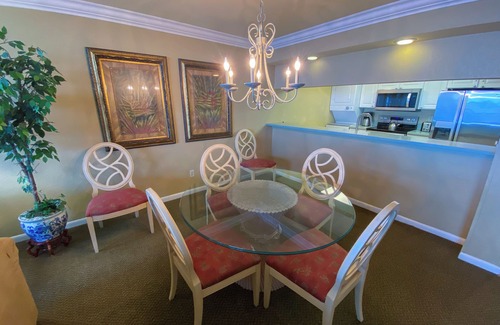 Punta Rassa Condo | Sanibel Harbour Resort Harbour Tower 315: Relaxing while watching for dolphins in the water below.