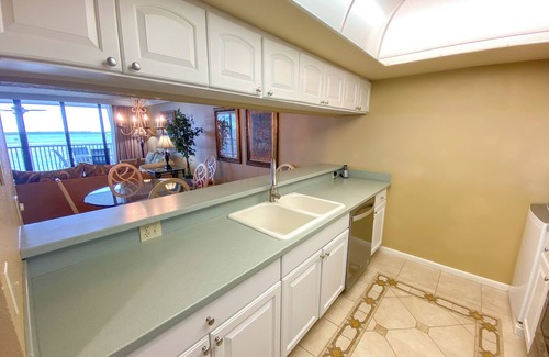 Punta Rassa Condo | Sanibel Harbour Resort Harbour Tower 315: Relaxing while watching for dolphins in the water below.