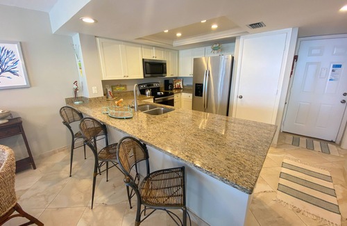 Punta Rassa Condo | Sanibel Harbour Resort Bay View Tower 731: Offering stunning views of the islands from the balcony.