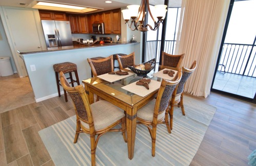 Punta Rassa Condo | Sanibel Harbour Resort Bay View Tower 837: Unwind & recharge in the wrap-around lanai.
