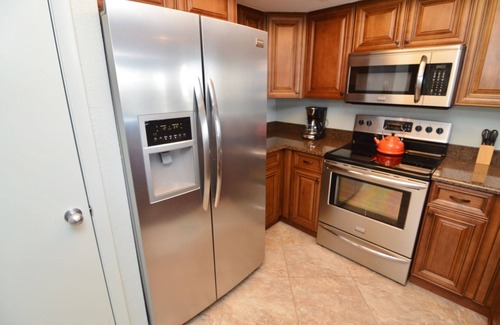 Punta Rassa Condo | Sanibel Harbour Resort Bay View Tower 837: Unwind & recharge in the wrap-around lanai.