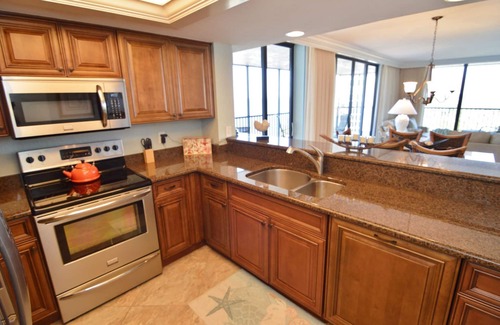 Punta Rassa Condo | Sanibel Harbour Resort Bay View Tower 837: Unwind & recharge in the wrap-around lanai.