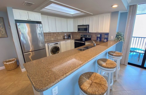 Punta Rassa Condo | Sanibel Harbour Resort 237: Experience the sunsets on this Waterfront wrap around lanai