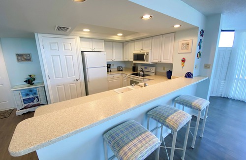 Punta Rassa Apartment | Sanibel Harbour Resort: Bay View Tower 137 Waterfront condo with private beach