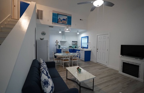 Chapel Hill Cottage | Santorini Cave Style Cottage with Fenced-in Yard
