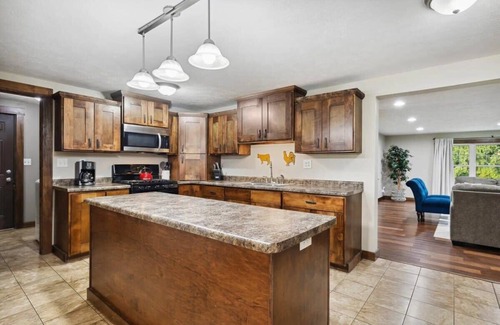 Sawyer House | Sawyer Farmhouse -Spacious Retreat with 5 Bedrooms