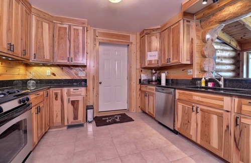 Fifield House | Scandinavian hand-scribed full log home on 31 acres and a quiet lake and trails
