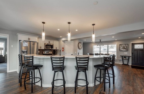 Waterfront Greens House | Scenic Dog Friendly Stay w/Hot Tub & Fire Pit