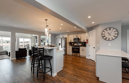 Waterfront Greens House | Scenic Dog Friendly Stay w/Hot Tub & Fire Pit