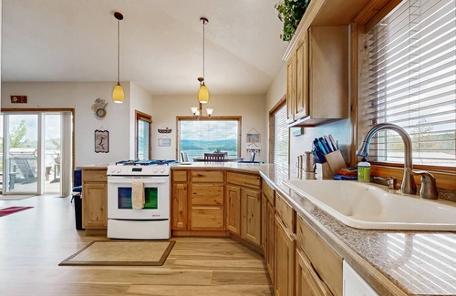 Coeur d'Alene House | Scenic lakefront retreat w/three decks, a hot tub & a private 48-foot dock
