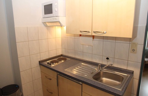 Uttum Apartment | Schöne Ferienwohnung für Eine Person im Müllerhaus Uttum